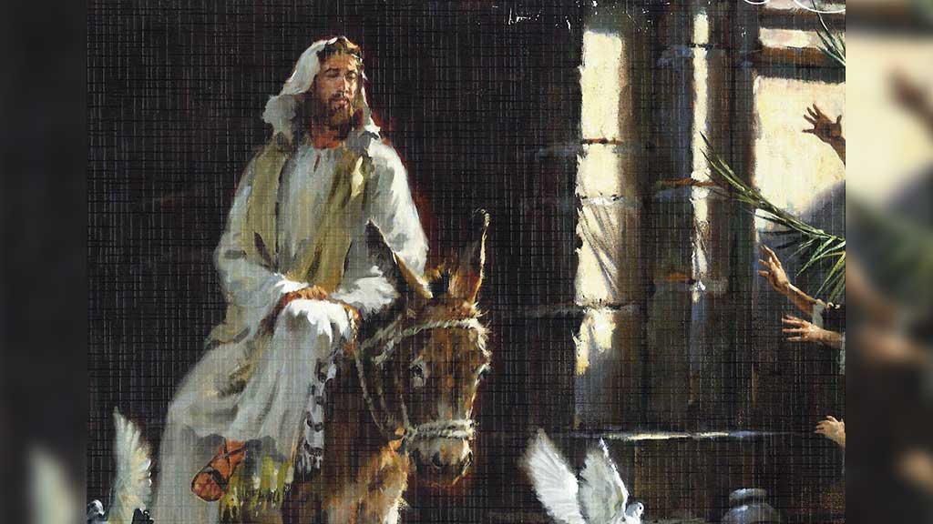 What is the meaning of Jesus ride into Jerusalem on a donkey
